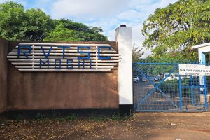 Photo in front of the schools gate.